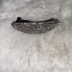 Bedazzled rhinestone hair clip.